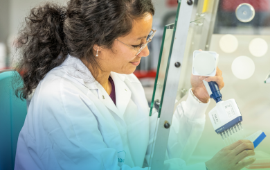 A ProQRian working on a cell culture in the laboratory