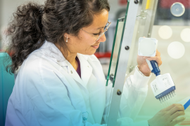 A ProQRian working on a cell culture in the laboratory